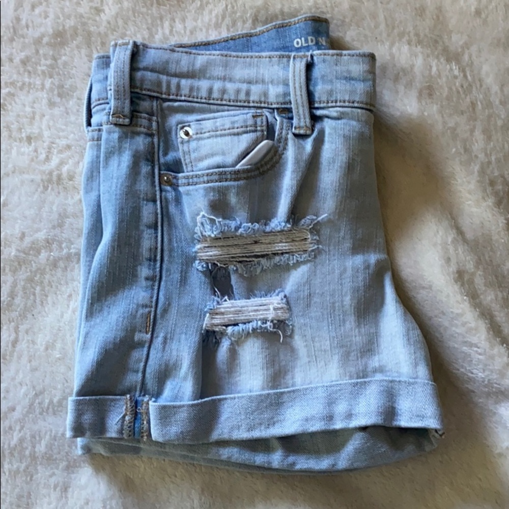 Ripped blue jean shorts
